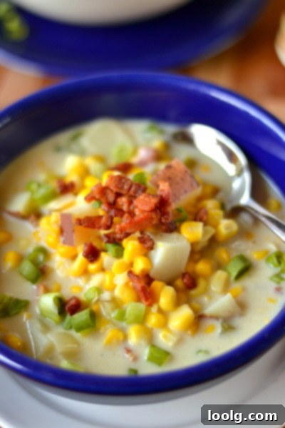 A large pot filled with creamy corn soup, ready to be served