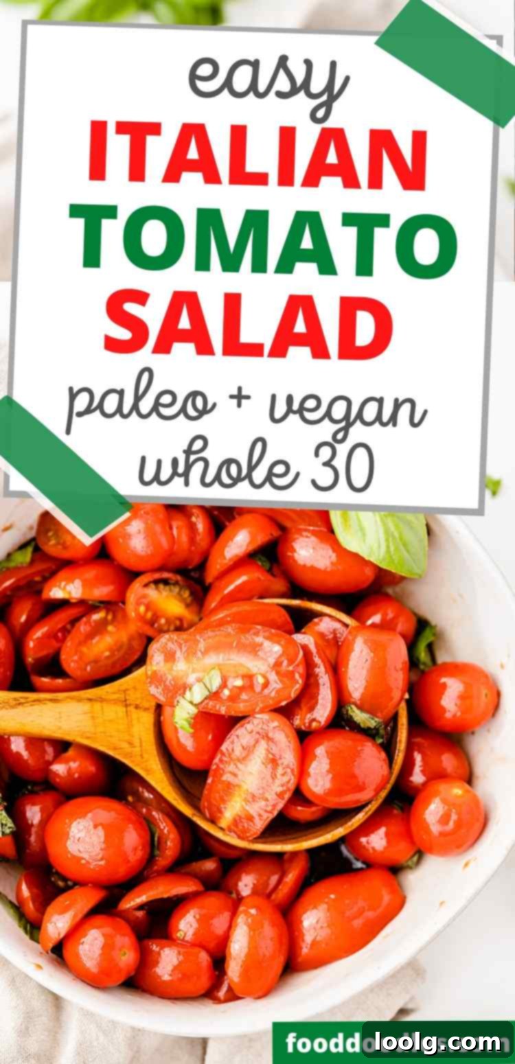 Italian Tomato Salad garnished with fresh basil leaves