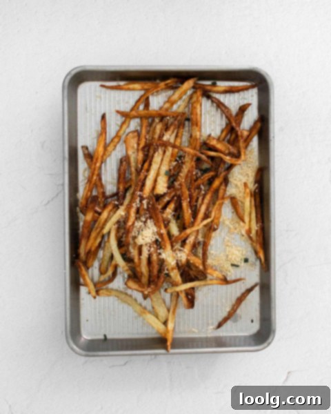 Air Fryer Garlic Fries soaking in ice water