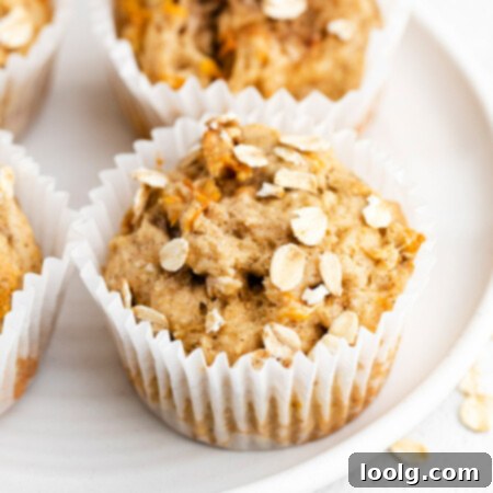 banana carrot muffin on white plate