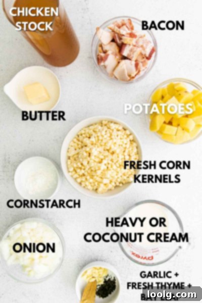 All the basic ingredients laid out for making corn chowder, including fresh corn, potatoes, onions, bacon, and herbs
