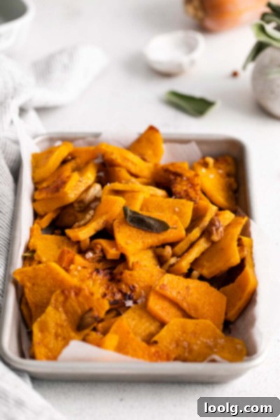 Butternut squash and sage ingredients on a wooden board
