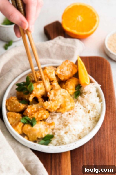 Air Fryer Orange Chicken in the air fryer basket