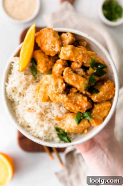 Air fryer orange chicken on a serving plate