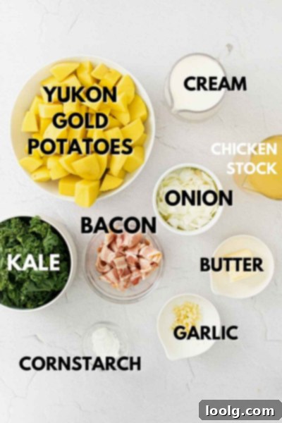 Close-up of fresh kale, garlic cloves, and Yukon gold potatoes, key ingredients for Colcannon soup.