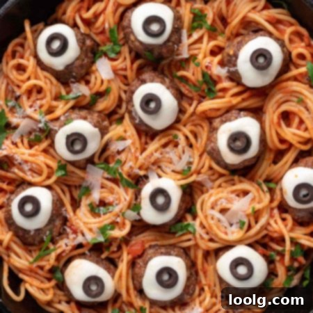 Halloween Eyeball Meatballs on a plate with spaghetti