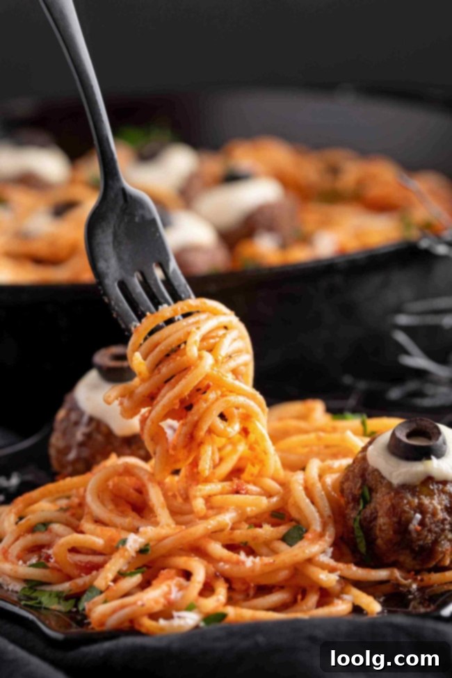 A bowl of Halloween Meatballs on spaghetti