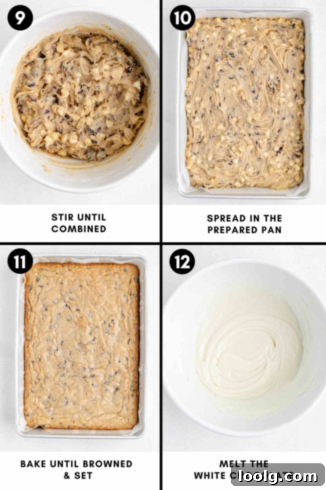 The process of making the blissful cranberry bars: frosting the bars with a white chocolate cream cheese frosting.