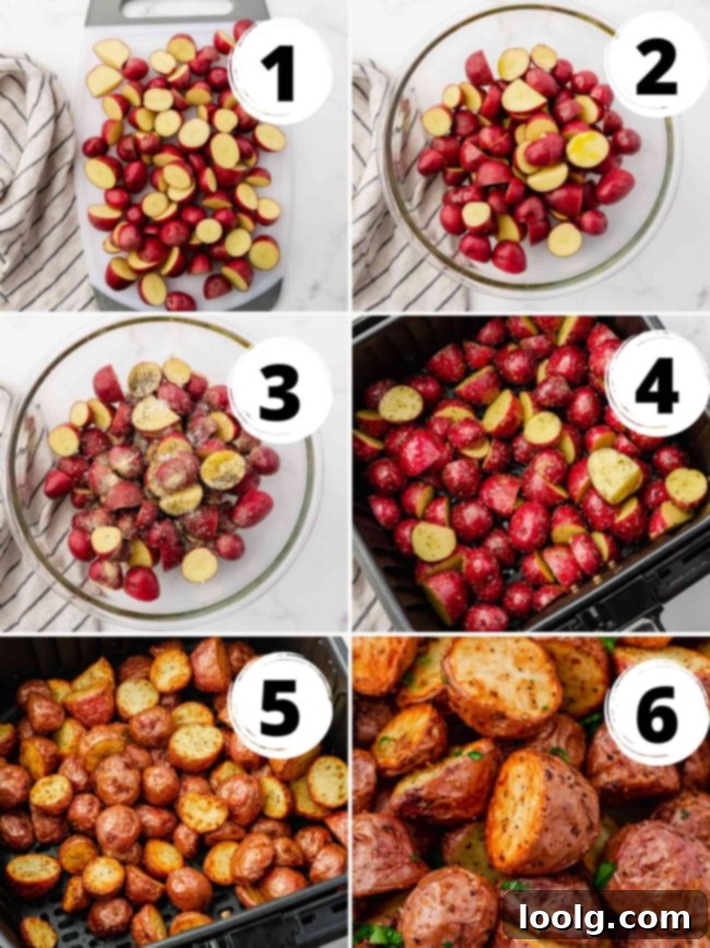 Air fryer basket filled with seasoned red potatoes, ready for cooking.