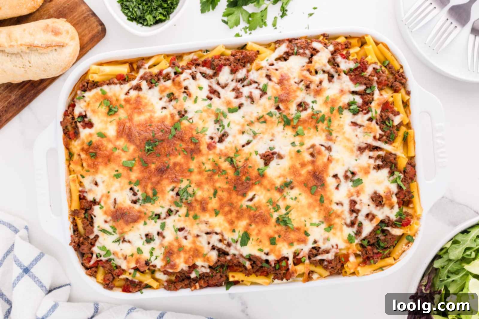 venison casserole topped with a layer of browned cheese