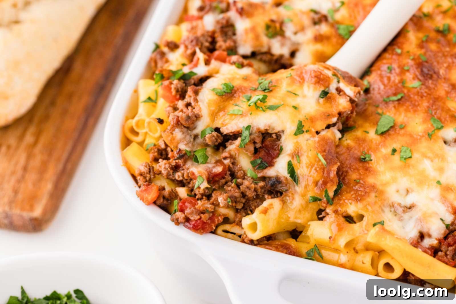 white casserole dish filled with venison pasta bake