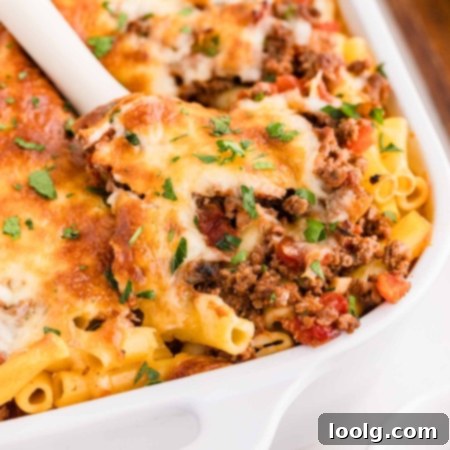 spoon digging into ziti