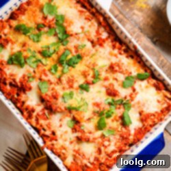 image of a dish of quinoa pizza casserole garnished with fresh parsley