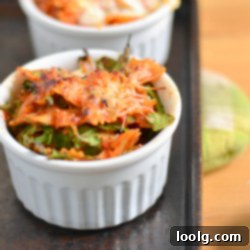 Roasted Red Pepper and Feta Pasta Bake, golden and bubbly, in a baking dish