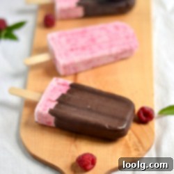 Chocolate Covered Raspberry Cheesecake Popsicles with Graham Cracker Crust