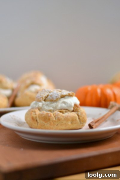 Close-up of golden brown Whole Wheat Pumpkin Cream Puffs ready for filling