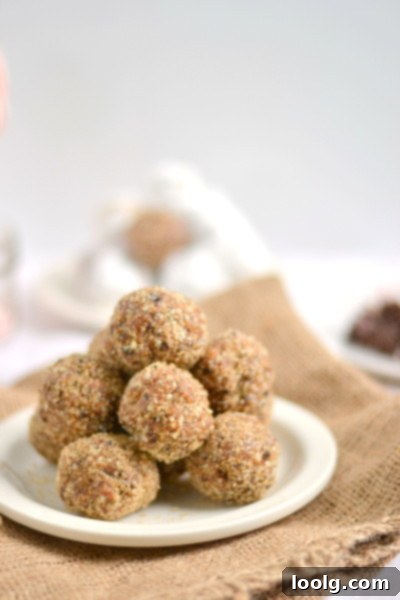 Assortment of sugar plums, some plain, some rolled in raw sugar, next to a bowl of raw sugar for coating.
