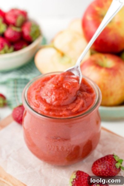 Little Bites for Little Ones 8 Healthy 2-ingredient Strawberry Applesauce - a bowl of pink applesauce