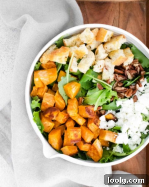 Goat Cheese Sweet Potato Medley 2 Sweet Potato Goat Cheese Salad overhead shot with roasted sweet potatoes, crumbled goat cheese, pecans, and greens