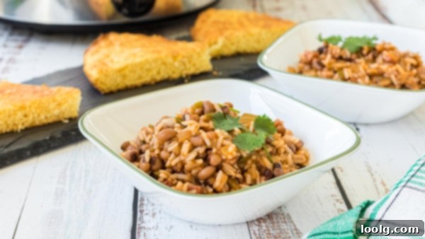 Lucky Slow Cooker Hoppin' John 8 A beautifully plated serving of Hoppin' John with fresh herbs.