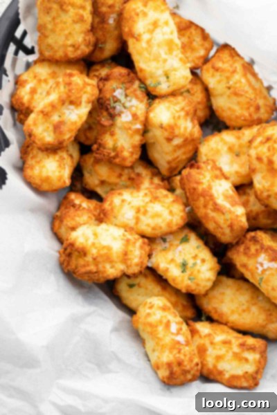 Crispy Air Fryer Tater Tots with Hash Brown Hack 3 Air fryer tater tots in basket