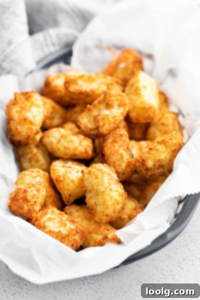 Crispy Air Fryer Tater Tots with Hash Brown Hack 8 basket full of Air fryer tater tot