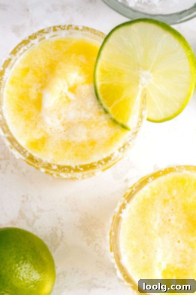 Easy 4-Ingredient Frozen Pineapple Margarita 4 overshot of frozen pineapple margarita