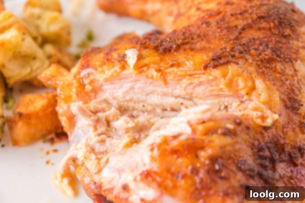 Perfectly Smoked Chicken Quarters 6 Four perfectly smoked chicken leg quarters arranged on a serving platter, ready to be enjoyed.