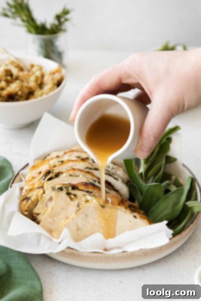 Juicy Instant Pot Turkey Breast 2 gravy being poured over instant pot turkey breast