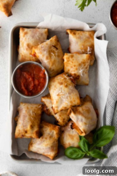 Crispy Air Fryer Pizza Bites 2 overhead shot of tray of air fryer pizza rolls
