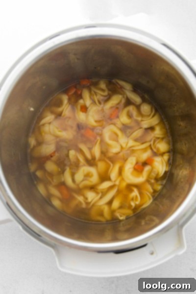 Speedy & Satisfying Tortellini Soup 6 Cooked tortellini in the Instant Pot after pressure release, ready for final additions