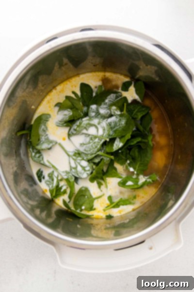 Speedy & Satisfying Tortellini Soup 7 Adding fresh baby spinach and heavy cream to the Instant Pot tortellini soup