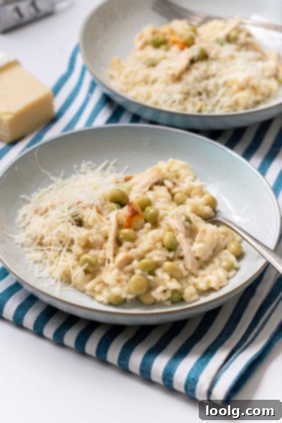 Creamy Chicken and Pea Risotto 5 A close-up shot of creamy chicken and pea risotto in a bowl, showing texture