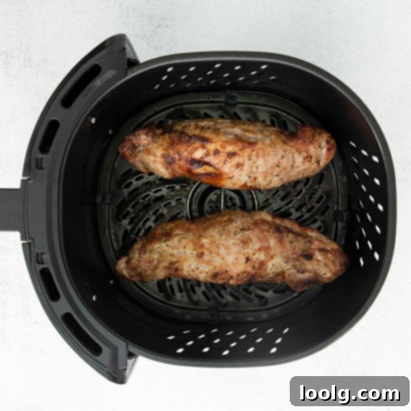 Perfect Air Fryer Pork Tenderloin 4 Air Fryer Pork Tenderloin sliced and served with sides