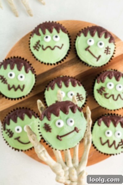 Two Frankenstein cupcakes side by side