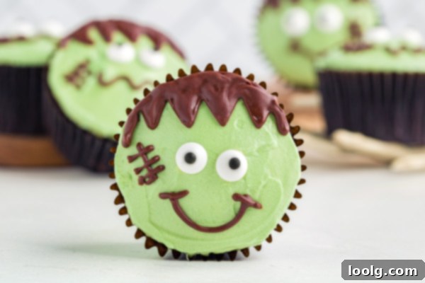 Frankenstein cupcakes with green frosting and chocolate details