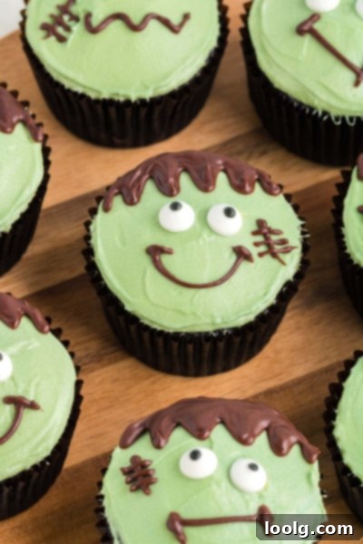 Frankenstein cupcake with green frosting and black hair