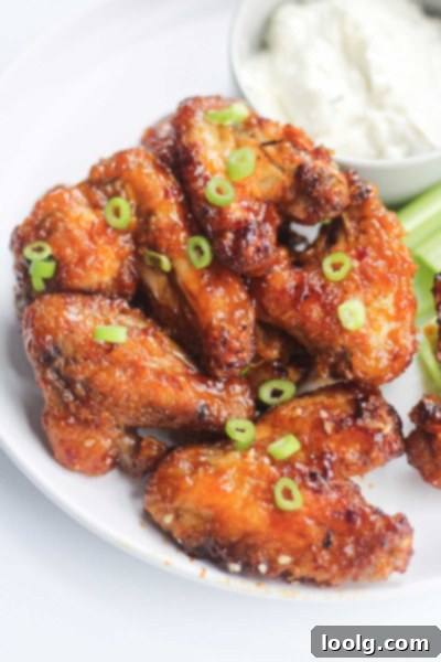 Baked or Air Fried Honey Garlic Wings 10 Ingredients for honey garlic chicken wings, including honey, soy sauce, chili sauce, and garlic