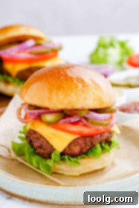 Your Air Fryer Game Day Playbook 4 Turkey burger on a piece of parchment paper