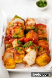 Your Air Fryer Game Day Playbook 6 Colorful chicken pineapple kabobs on skewers