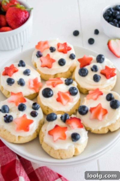 Patriotic Cookies for Memorial Day and July Fourth 11 A close-up of a Memorial Day Cookie with a star cut-out strawberry and blueberries.