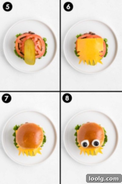 The Ultimate Monster Burger 11 Two finished Halloween monster burgers on a serving plate with a light background.