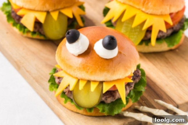 The Ultimate Monster Burger 14 Two monster burgers for Halloween on a serving plate, ready to eat.
