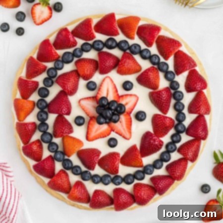 Patriotic Fruit Pizza 15 Delicious 4th of July Fruit Pizza with patriotic berry decoration