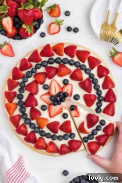 Patriotic Fruit Pizza 10 Close-up of a fruit pizza showcasing a mix of berries and possibly other fruits