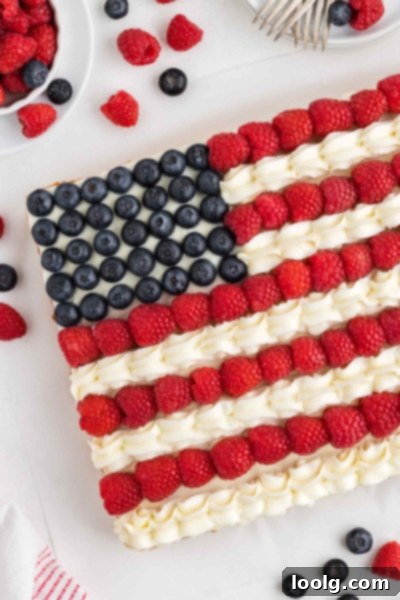 A Slice of Liberty 14 Independence Day Cake with a single slice cut out, ready to be served
