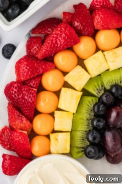 Kaleidoscope of Fruit 5 Another perspective of the assembled rainbow fruit platter, emphasizing the inviting arrangement and the 'cloud' dips.