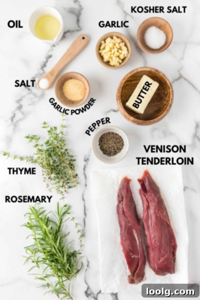 Wild Venison Tenderloin 3 Close-up of fresh rosemary, thyme, and garlic cloves, ingredients for herb butter