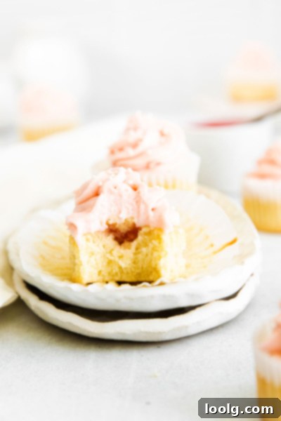Spring Rhubarb Delights 6 rhubarb cupcake with bite in it