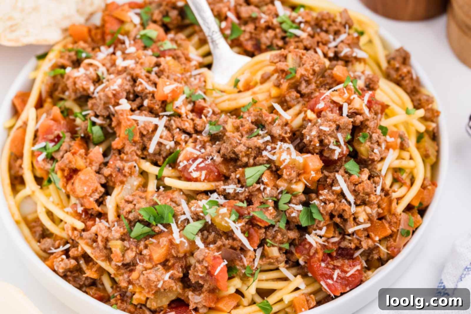 Slow-Simmered Venison Bolognese 15 close-up of venison bolognese in a white bowl